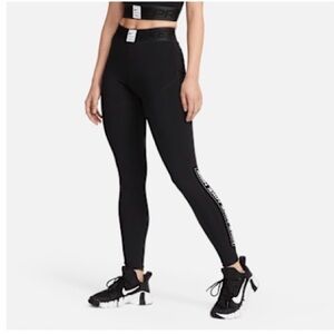Nike Pro Dri-FIT Women's Graphic Mid-
Rise Leggings